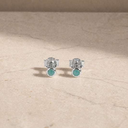 Sterling silver amazonite stud earrings with round cabochon gemstones.