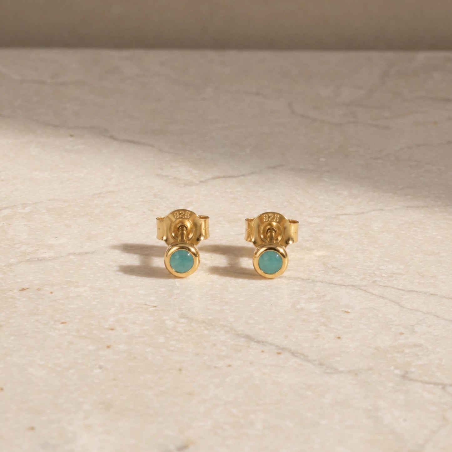 14ct gold vermeil amazonite stud earrings with round cabochon gemstones.