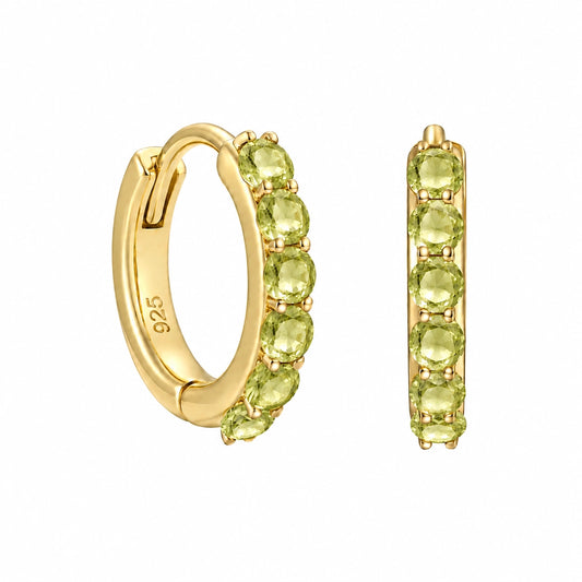 Pair of 14ct gold vermeil huggie hoop earrings with six faceted light green peridot gemstones in a claw setting, shown from front and angled views on a white background with a polished finish.