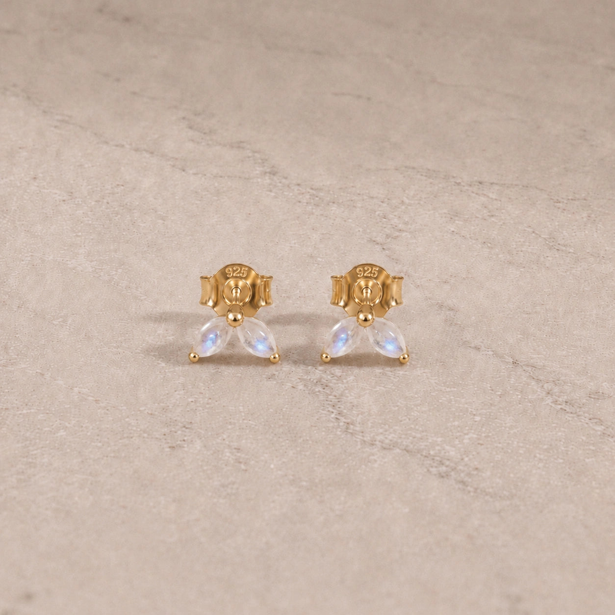 14ct gold vermeil rainbow moonstone marquise stud earrings with smooth cabochon gemstones.