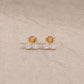 14ct gold vermeil rainbow moonstone marquise stud earrings with smooth cabochon gemstones.