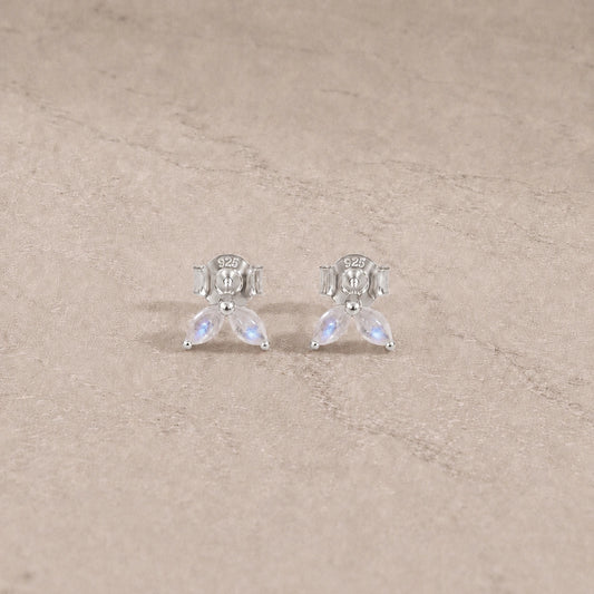 Sterling silver rainbow moonstone marquise stud earrings with smooth cabochon gemstones.