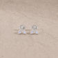 Sterling silver rainbow moonstone marquise stud earrings with smooth cabochon gemstones.